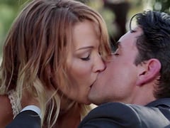 Jessica Drake sucks a fellow's cock while being in a car