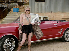 Solo babe Scarlett Sage moans loudly while she fingers her pussy